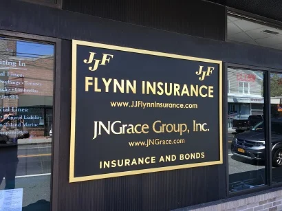 Flynn Insurance and JN Grace Group sign at 8 Main Street, Kings Park